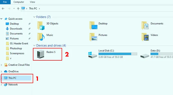 Giao diện This PC trên máy tính hiển thị các ổ đĩa và thiết bị di động, hướng dẫn cách mở kết nối điện thoại với máy tính để truy cập dữ liệu.