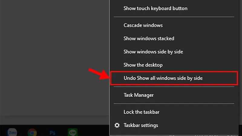Nhấn chuột phải vào thanh Taskbar để hoàn tác bố cục màn hình đã chia