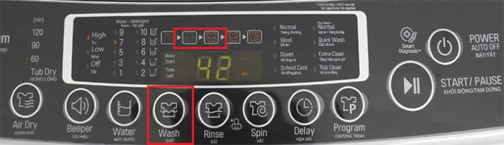 Nút WASH trên máy giặt LG cửa trên để kích hoạt chế độ giặt ngâm