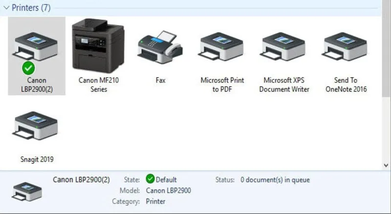 Biểu tượng máy in Canon LBP 2900 với dấu kiểm xanh lá, xác nhận máy đã được đặt làm máy in mặc định