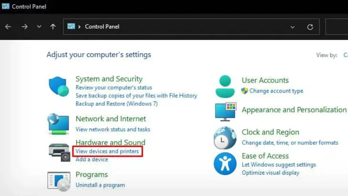 Màn hình Control Panel, chọn View devices and printers để quản lý máy in HP