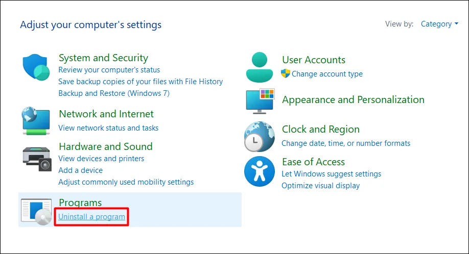 Chọn Uninstall a Program trong Control Panel để quản lý ứng dụng, bước quan trọng để sửa lỗi file trắng