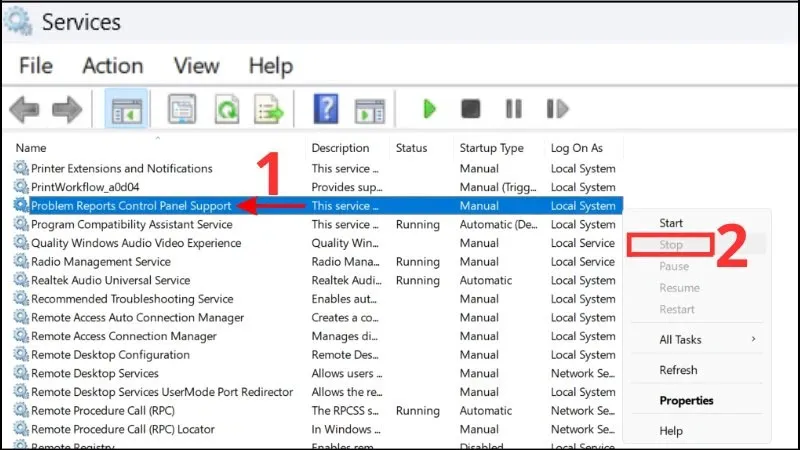 Giao diện Windows Services, với dịch vụ &quot;Problem Reports and Solution Control Panel Support&quot; được chọn và tùy chọn &quot;Stop&quot; đang hiển thị.