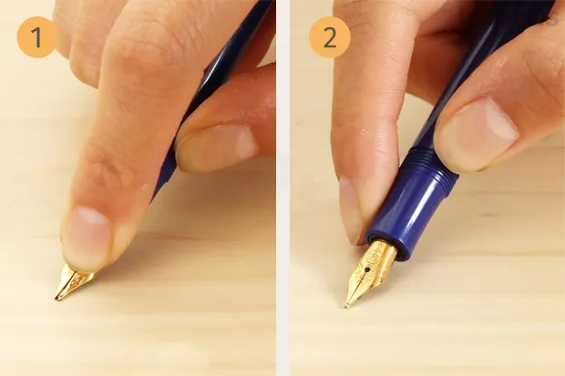 Nhẹ nhàng ấn ngạnh bút theo chiều ngược lại