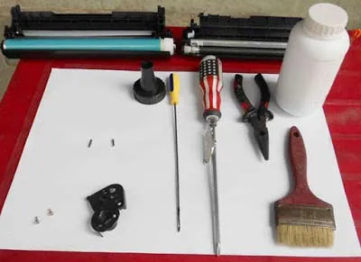 Dụng cụ cần thiết cho cách mở hộp mực máy in Canon 2900 và đổ mực