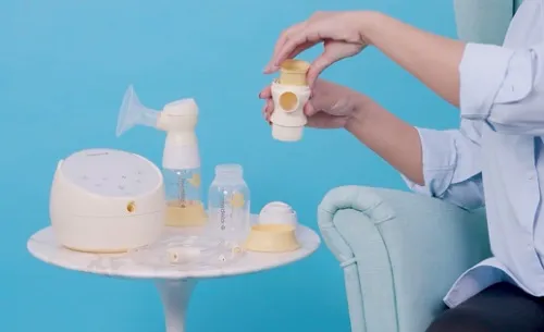 Van vàng đã được tháo ra khỏi cổ nối của máy hút sữa Medela Sonata