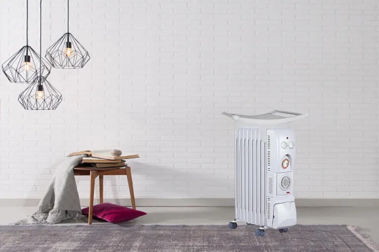 Máy sưởi dầu Saiko đặt gọn gàng trong không gian phòng ngủ