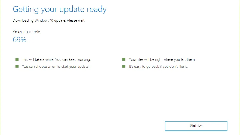 Chờ quá trình cập nhật hoàn tất và khởi động lại máy
