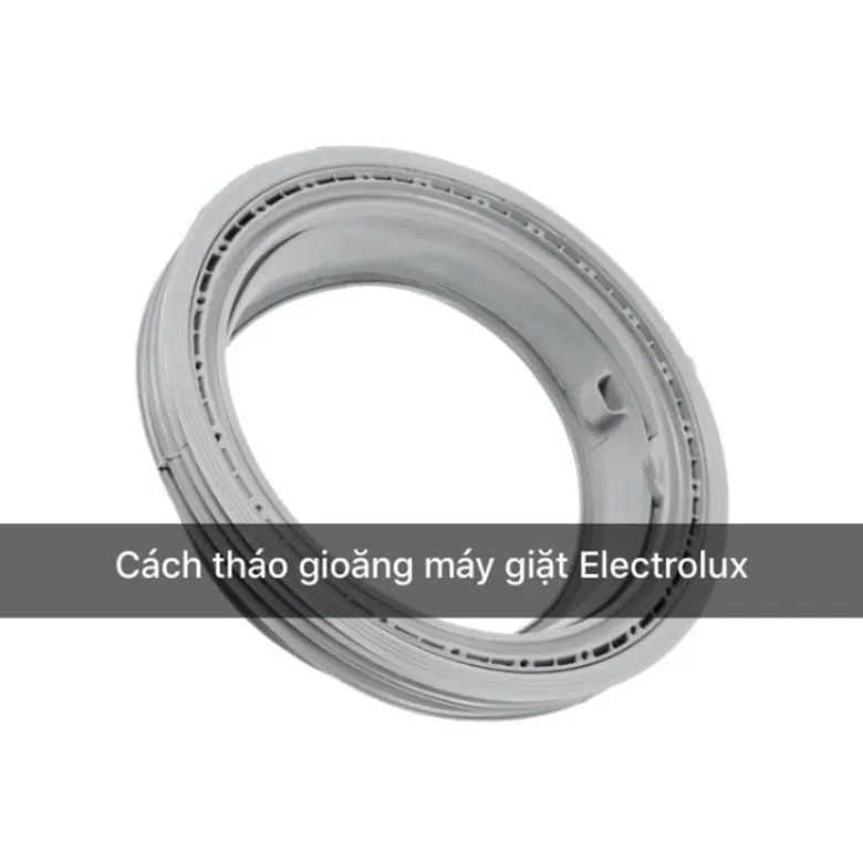 Người thợ đang thực hiện cách tháo gioăng máy giặt Electrolux cửa ngang một cách an toàn và chuyên nghiệp
