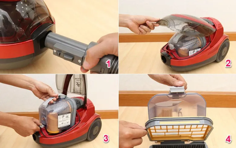 Thao tác đổ bụi từ khoang chứa của máy hút bụi Hitachi vào thùng rác, giữ vệ sinh cho thiết bị