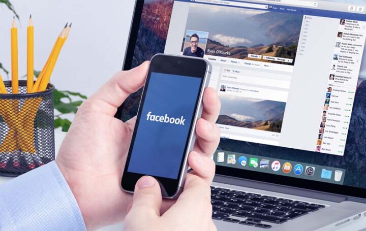 Màn hình máy tính hiển thị giao diện Facebook, minh họa cách mở một tài khoản Facebook ở hai máy trên trình duyệt khác nhau.