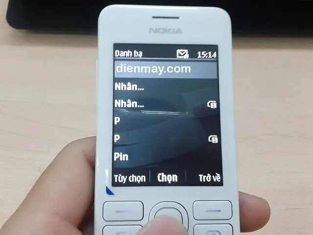 Chọn danh bạ rồi chọn tên người muốn gửi tin nhắn trên Nokoa 206