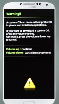 Hình ảnh điện thoại Samsung hiển thị màn hình cảnh báo trước khi vào chế độ Download Mode