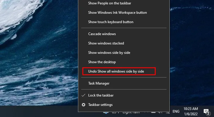 Hủy chế độ chia màn hình bằng cách chọn Undo Show all windows side by side