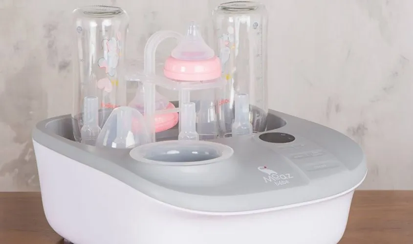 Hướng dẫn vệ sinh máy hâm sữa Moaz BéBé sau mỗi lần sử dụng để đảm bảo sạch sẽ.