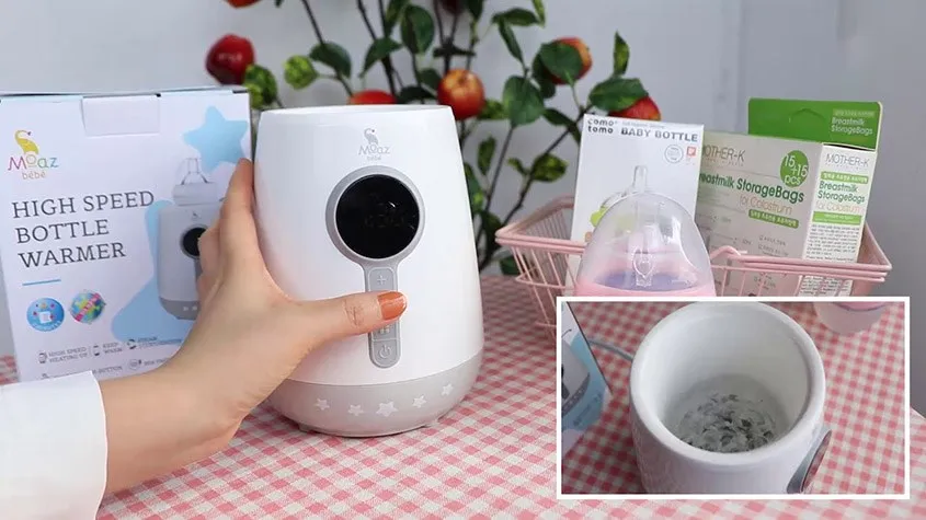Vệ sinh sâu máy hâm sữa Moaz BéBé để loại bỏ cặn bám, duy trì hiệu suất hoạt động.
