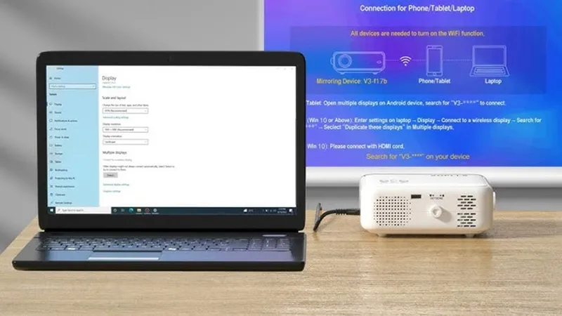 Laptop kết nối với máy chiếu mini qua HDMI