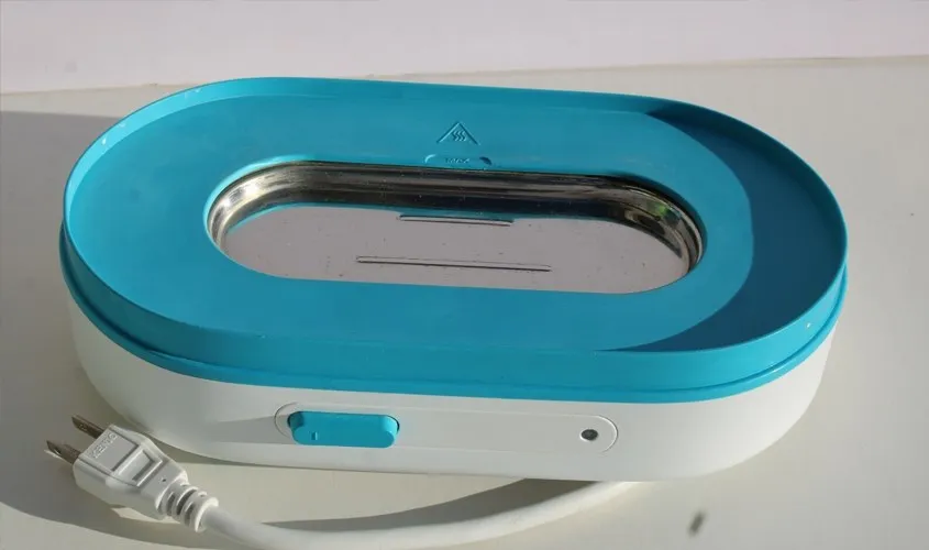 Luôn đổ hết nước và vệ sinh khay chứa của máy tiệt trùng bình sữa Avent sau mỗi lần sử dụng.