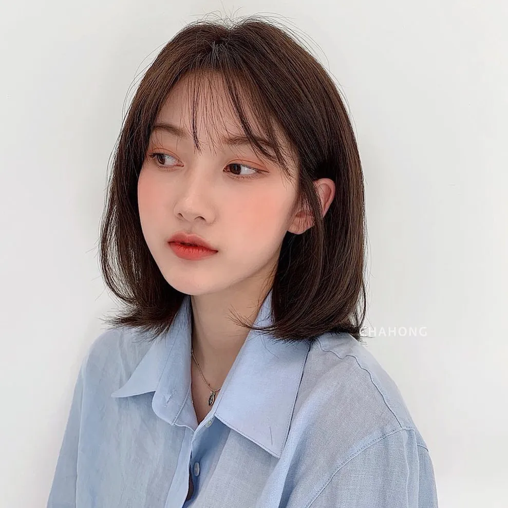 Kiểu tóc mái phồng tự nhiên sau khi áp dụng cách sử dụng lô uốn tóc mái